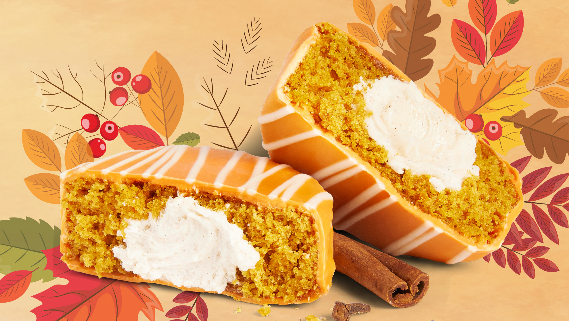 A pumpkin spice No Name Cake from MOD Pizza is sitting in front of leaves and a fall themed background.